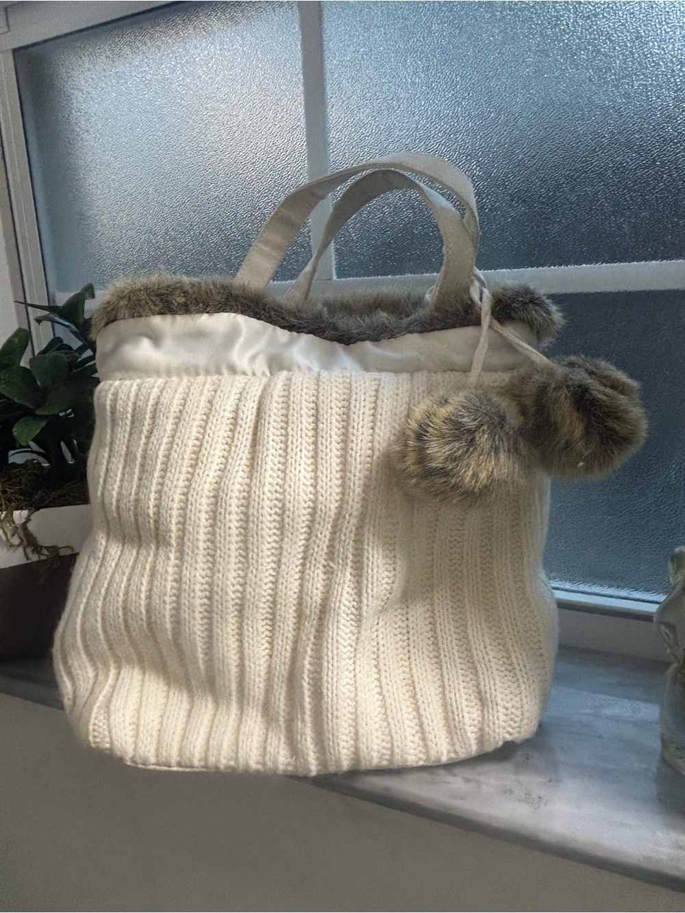 Cream knit tote bag from Bath & Body Works with faux fur trim